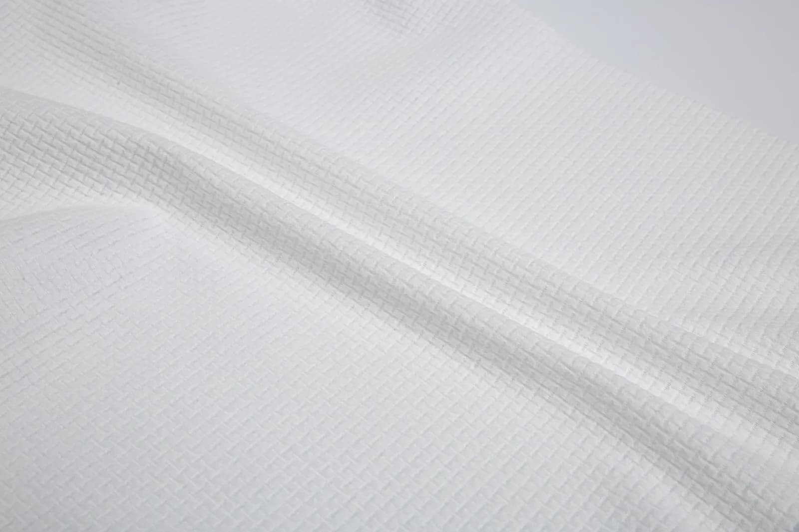 Eco-Pure 100% viscose biodegradable spunlace EF pattern white 50gsm interlocking weave sample